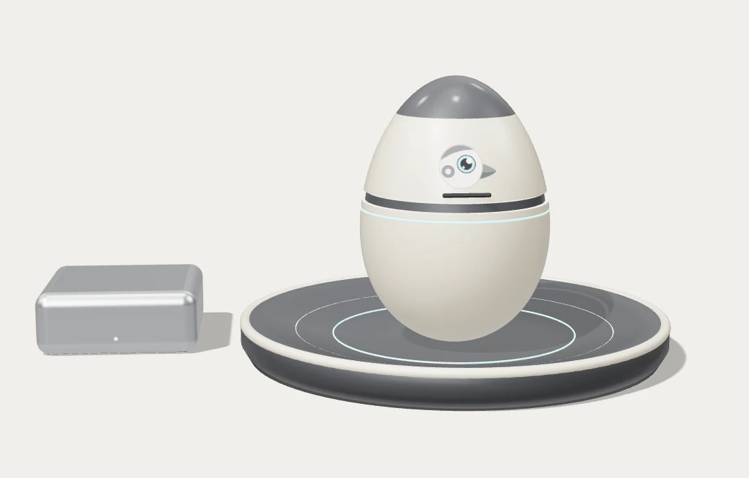 NanoEmu Base concept render: a large ivory egg with a graphite crown and a teal light line, standing in a round charging nest, next to a small mini PC for scale